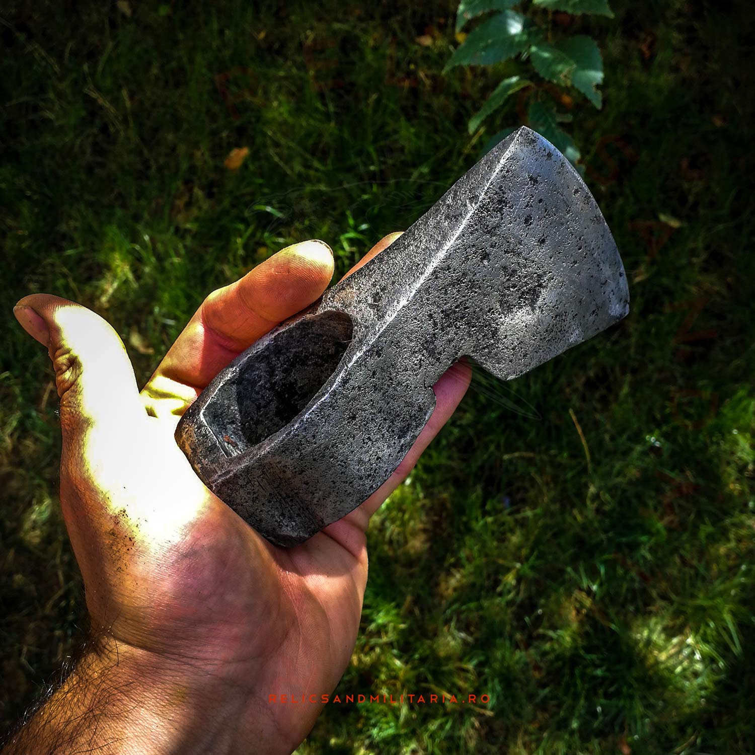 Restoring an old axe head found in the forest while metal detecting